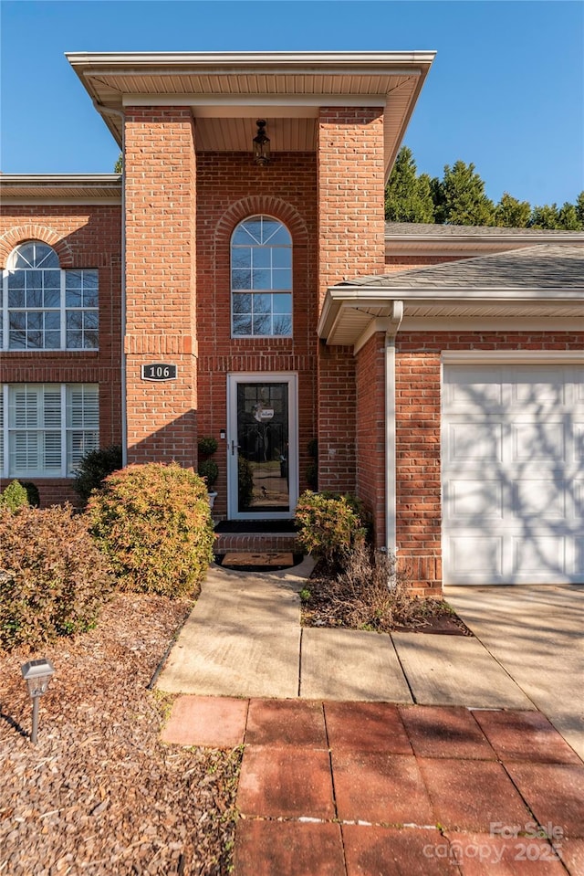 entrance to property with a garage