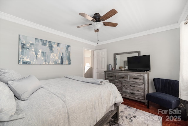 bedroom featuring ceiling fan, ornamental molding, and dark wood-type flooring