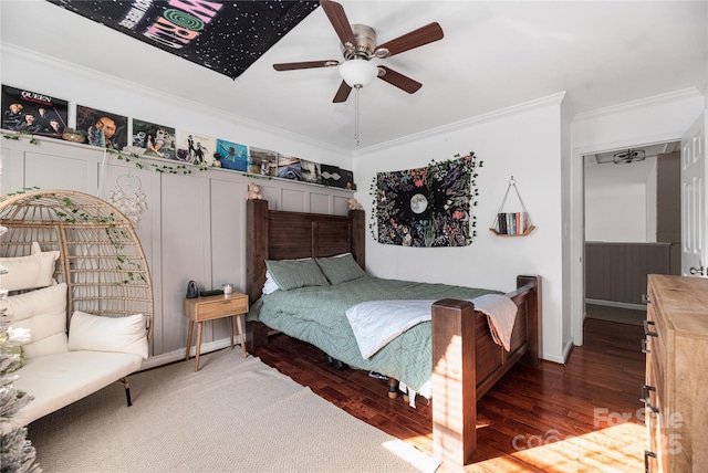 bedroom with ceiling fan, dark hardwood / wood-style flooring, and crown molding