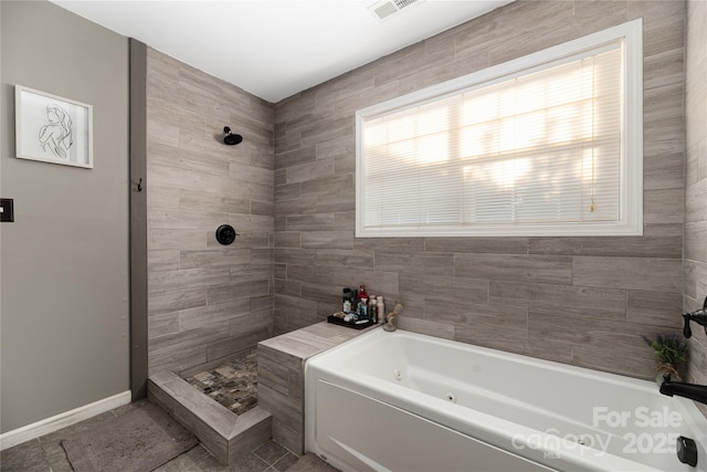 bathroom with tile patterned flooring and plus walk in shower