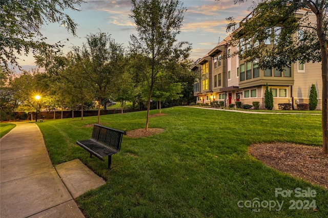 view of community featuring a lawn