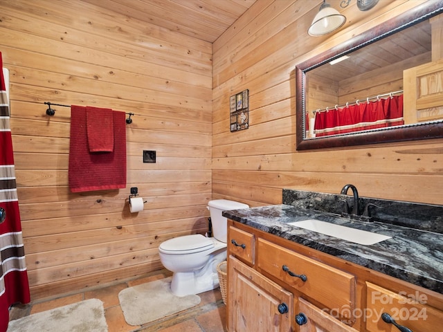 bathroom featuring vanity, walk in shower, wooden ceiling, wood walls, and toilet