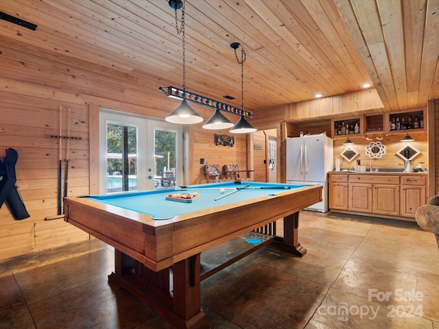 recreation room featuring pool table, wood walls, french doors, and wood ceiling