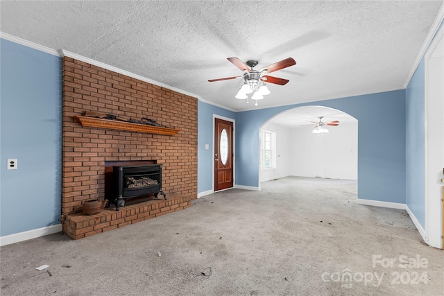 unfurnished living room featuring light carpet and a textured ceiling