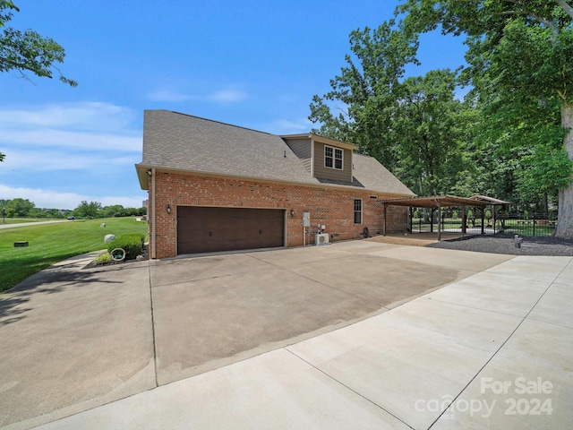 view of property exterior with a garage