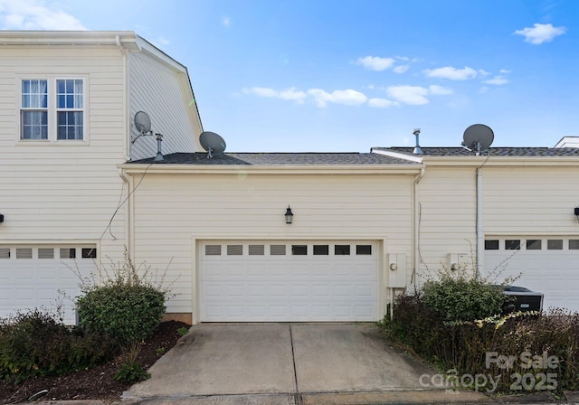 view of home's exterior with a garage