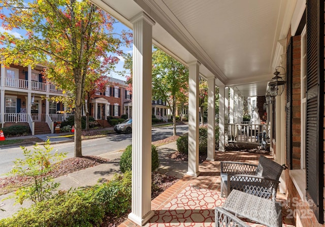 view of patio featuring a porch