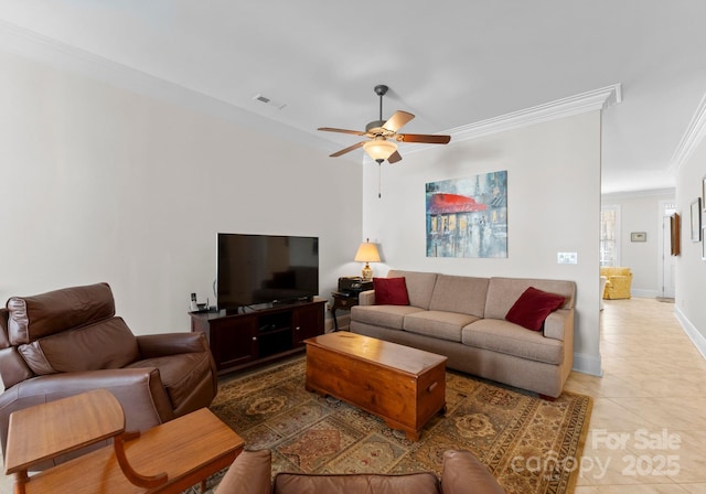 living room with tile patterned flooring, ceiling fan, and crown molding