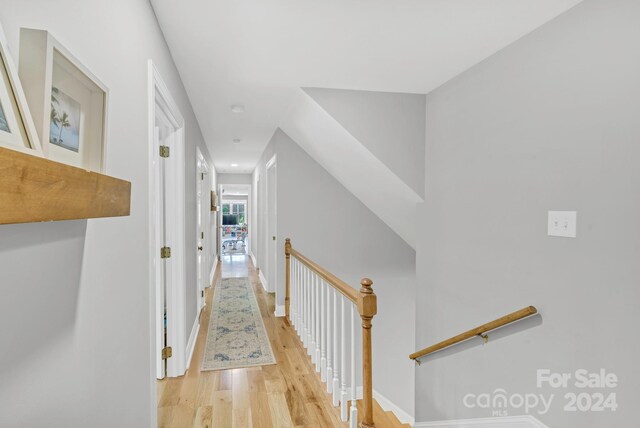 hallway featuring light wood-type flooring