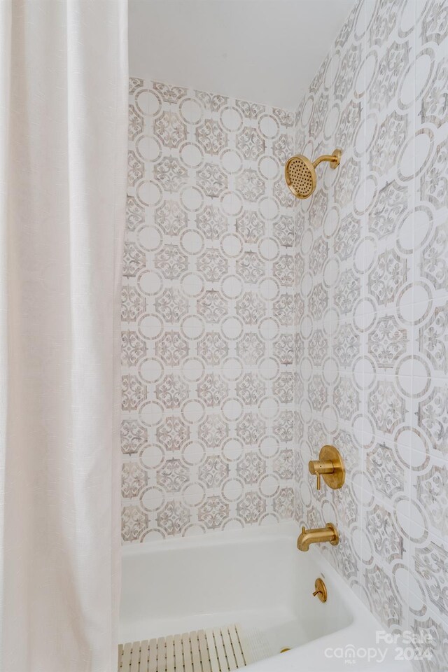 bathroom featuring tub / shower combination