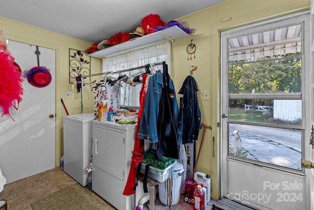 washroom with independent washer and dryer