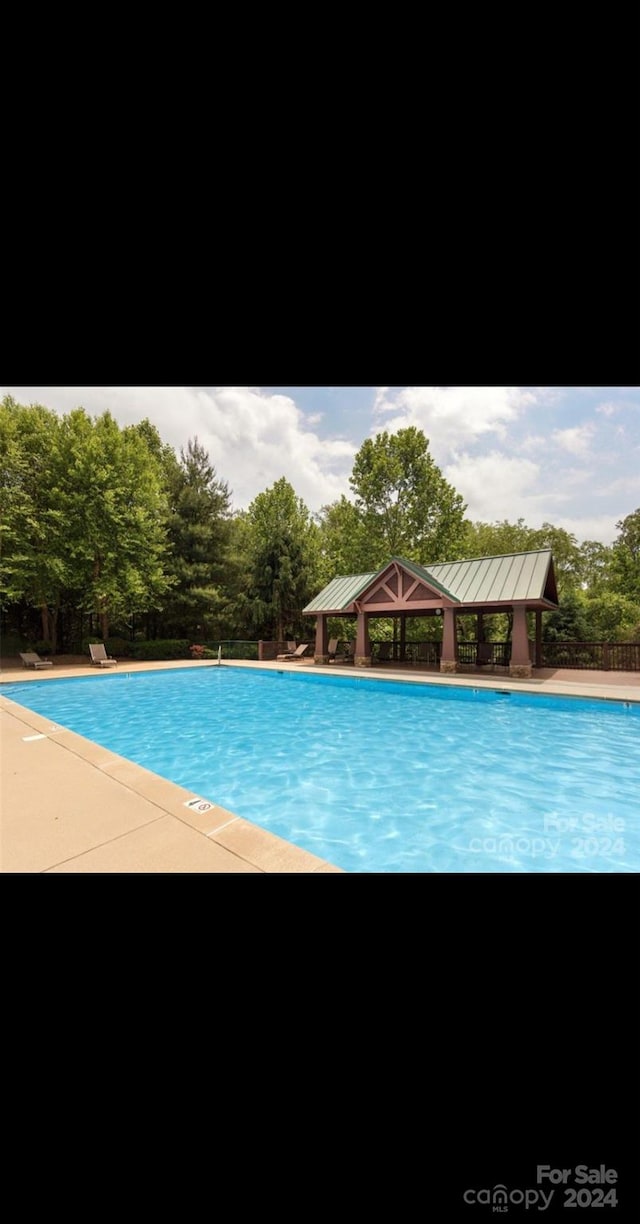 view of pool featuring a gazebo