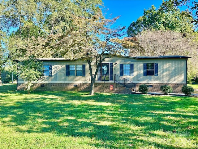 view of front of house with a front yard