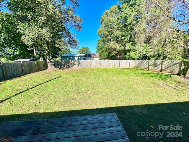 view of yard featuring a deck