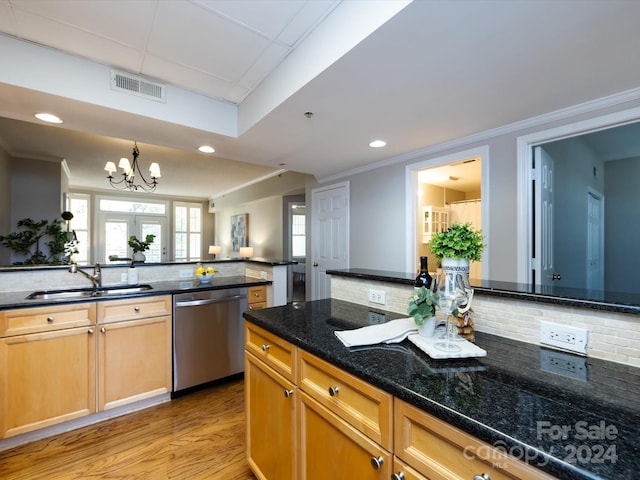 kitchen featuring tasteful backsplash, sink, light wood-type flooring, stainless steel dishwasher, and crown molding