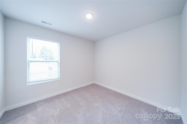 view of carpeted spare room