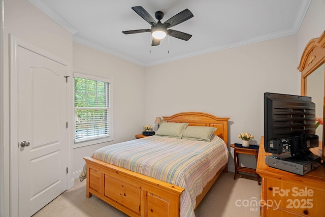 bedroom featuring ceiling fan, light carpet, and ornamental molding