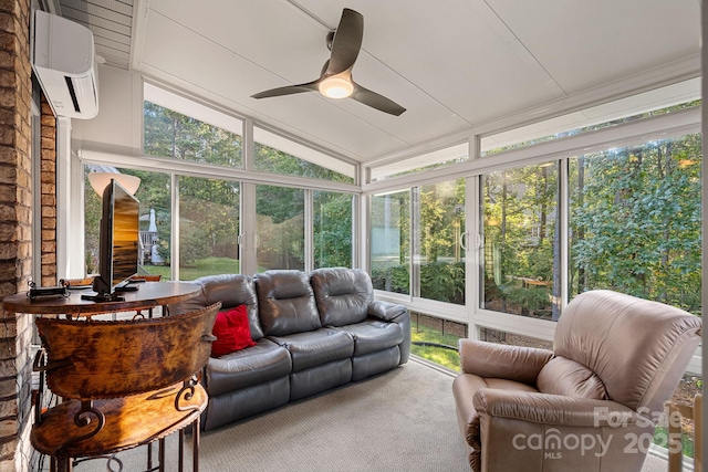 sunroom with a wall mounted air conditioner, ceiling fan, and lofted ceiling