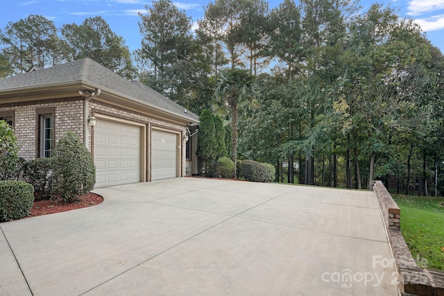 view of property exterior with a garage