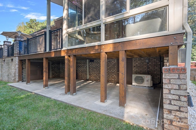 exterior space with ac unit and a wooden deck