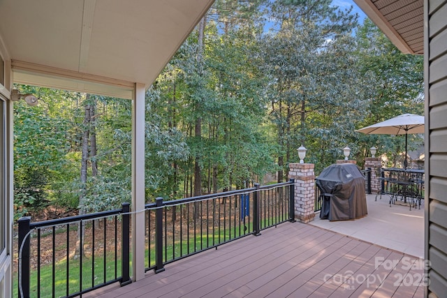 deck featuring grilling area