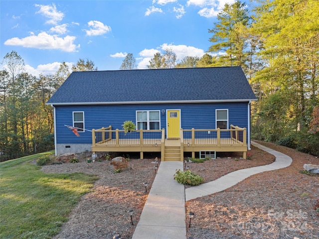 view of front of house featuring a deck