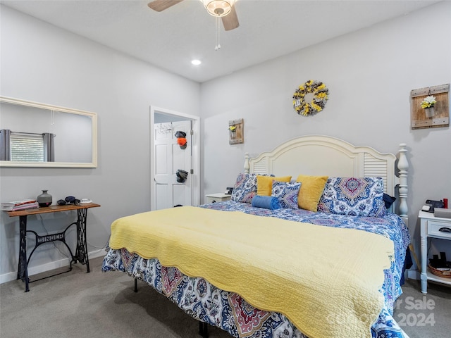 carpeted bedroom featuring ceiling fan