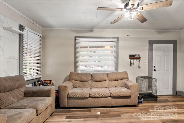 515 Suttle St, Shelby, NC 28150 - living area with wood finished floors, a ceiling fan, and ornamental molding