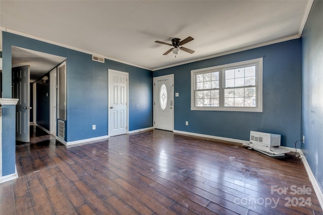 foyer with ceiling fan, dark hardwood / wood-style flooring, and ornamental molding