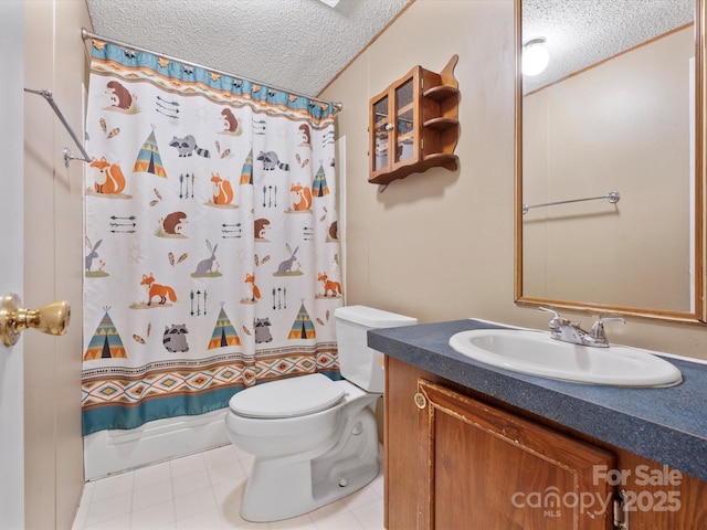 full bathroom with a textured ceiling, vanity, and toilet