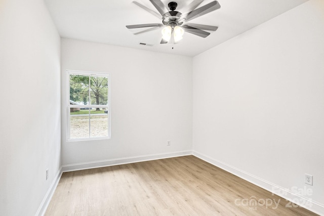 unfurnished room with ceiling fan and light hardwood / wood-style floors