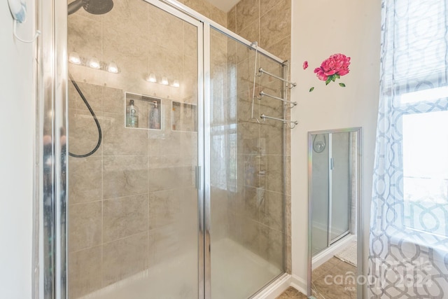 bathroom with an enclosed shower