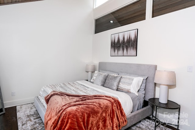 bedroom featuring hardwood / wood-style flooring