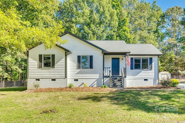 view of front facade with a front yard