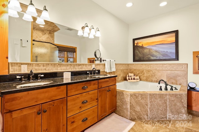 bathroom with vanity, separate shower and tub, and tile patterned flooring