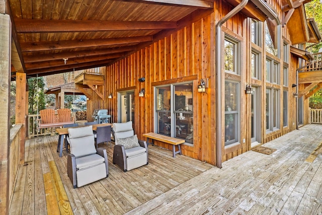 wooden deck featuring grilling area