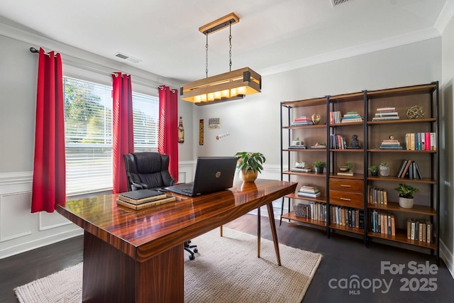 office space with ornamental molding and dark hardwood / wood-style flooring