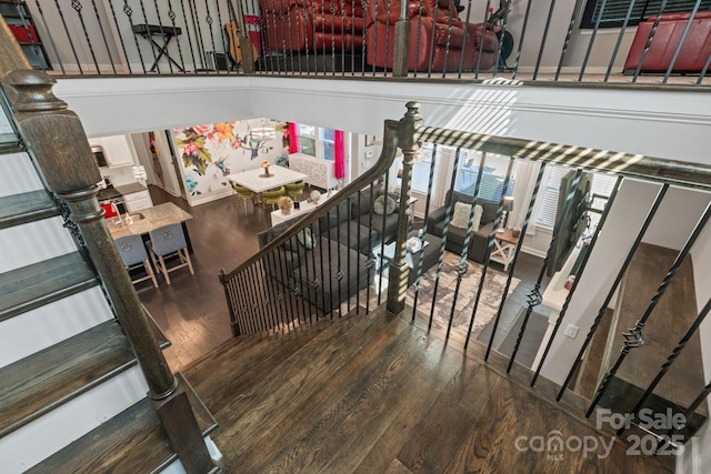 stairway with wood-type flooring