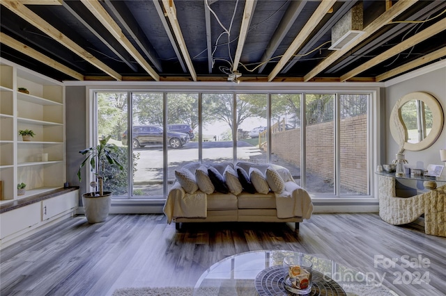 interior space featuring a healthy amount of sunlight and wood-type flooring