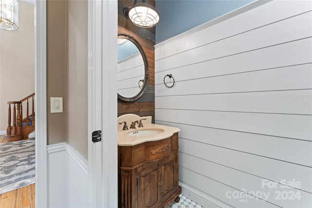 2720 Lentz Rd, China Grove, NC 28023 - half bathroom with wooden walls and vanity