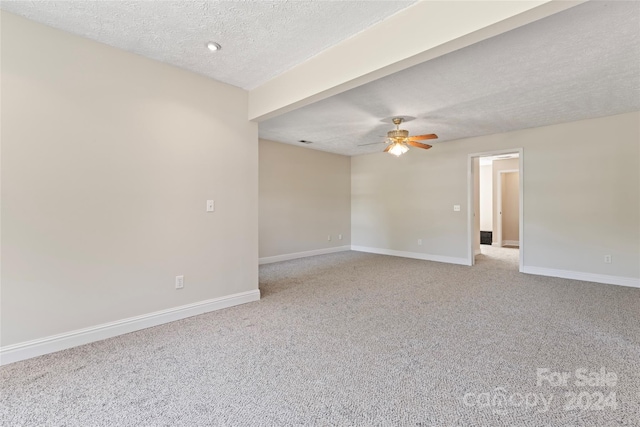 2720 Lentz Rd, China Grove, NC 28023 - carpeted spare room with a textured ceiling, a ceiling fan, and baseboards