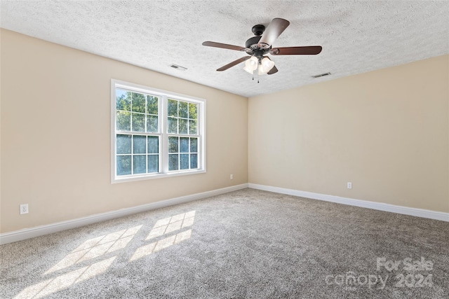 2720 Lentz Rd, China Grove, NC 28023 - empty room with ceiling fan, visible vents, a textured ceiling, and carpet flooring