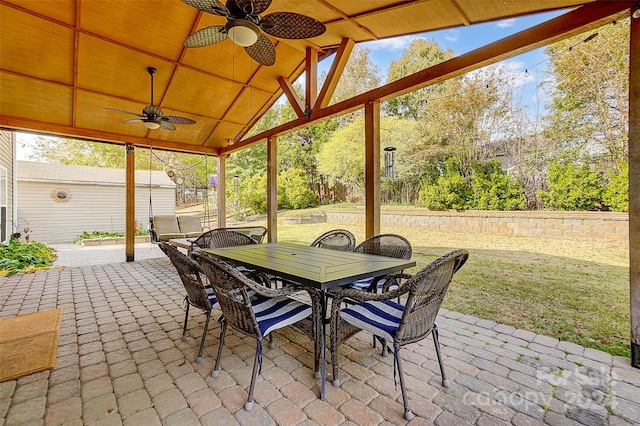 view of patio featuring ceiling fan