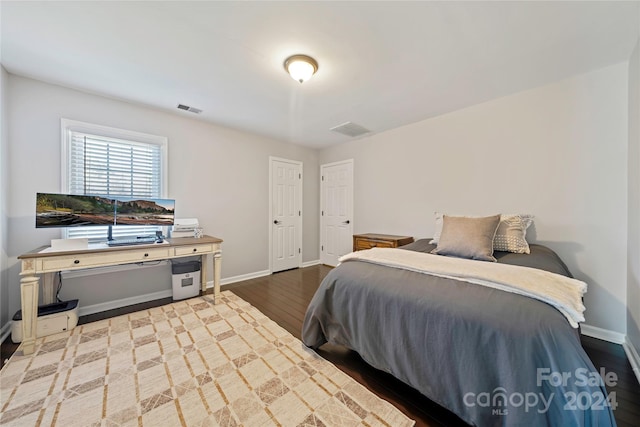 bedroom featuring hardwood / wood-style flooring