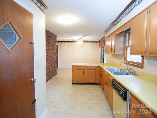 kitchen with dishwasher, sink, brick wall, kitchen peninsula, and a textured ceiling