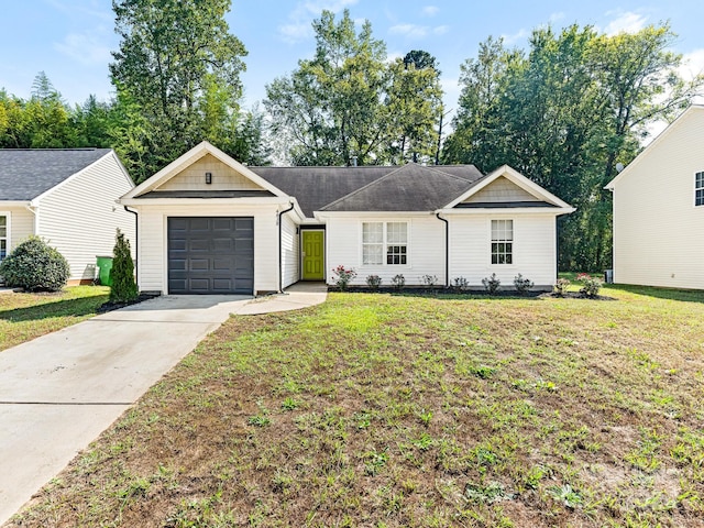 single story home featuring a garage and a front yard