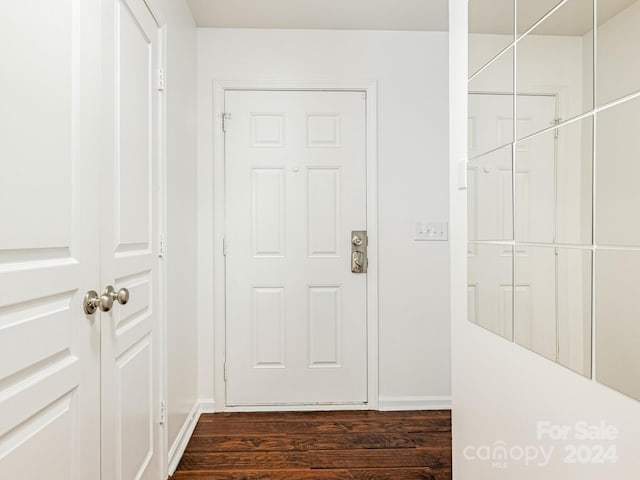 hallway featuring dark hardwood / wood-style floors