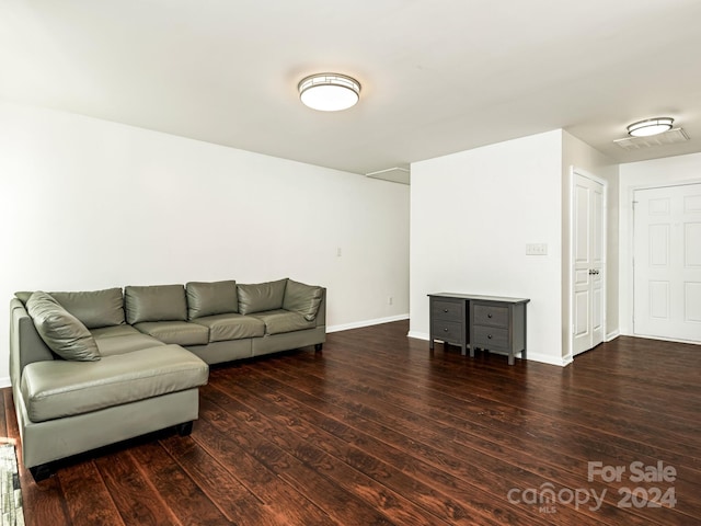 living room with dark wood-type flooring