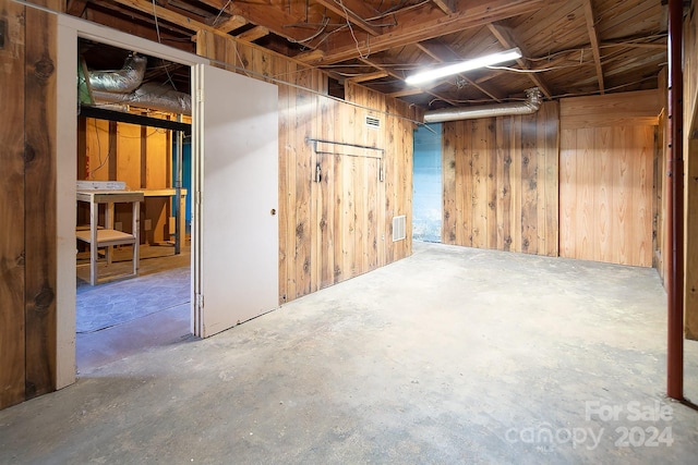 basement with wood walls