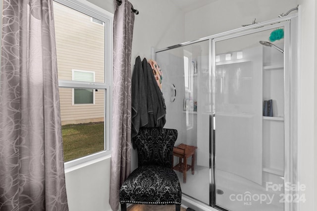 bathroom with an enclosed shower